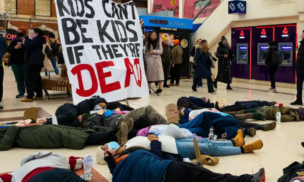 Trans youngsters hold ‘die in’ at London train station to oppose puberty blocker ban