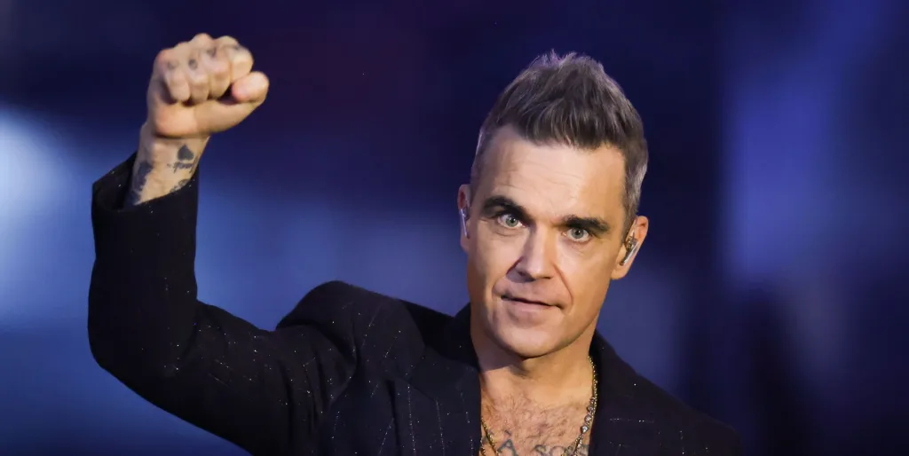 Robbie Williams jokes he ‘wants to be gay’: ‘I’ve done everything but suck a c**k’